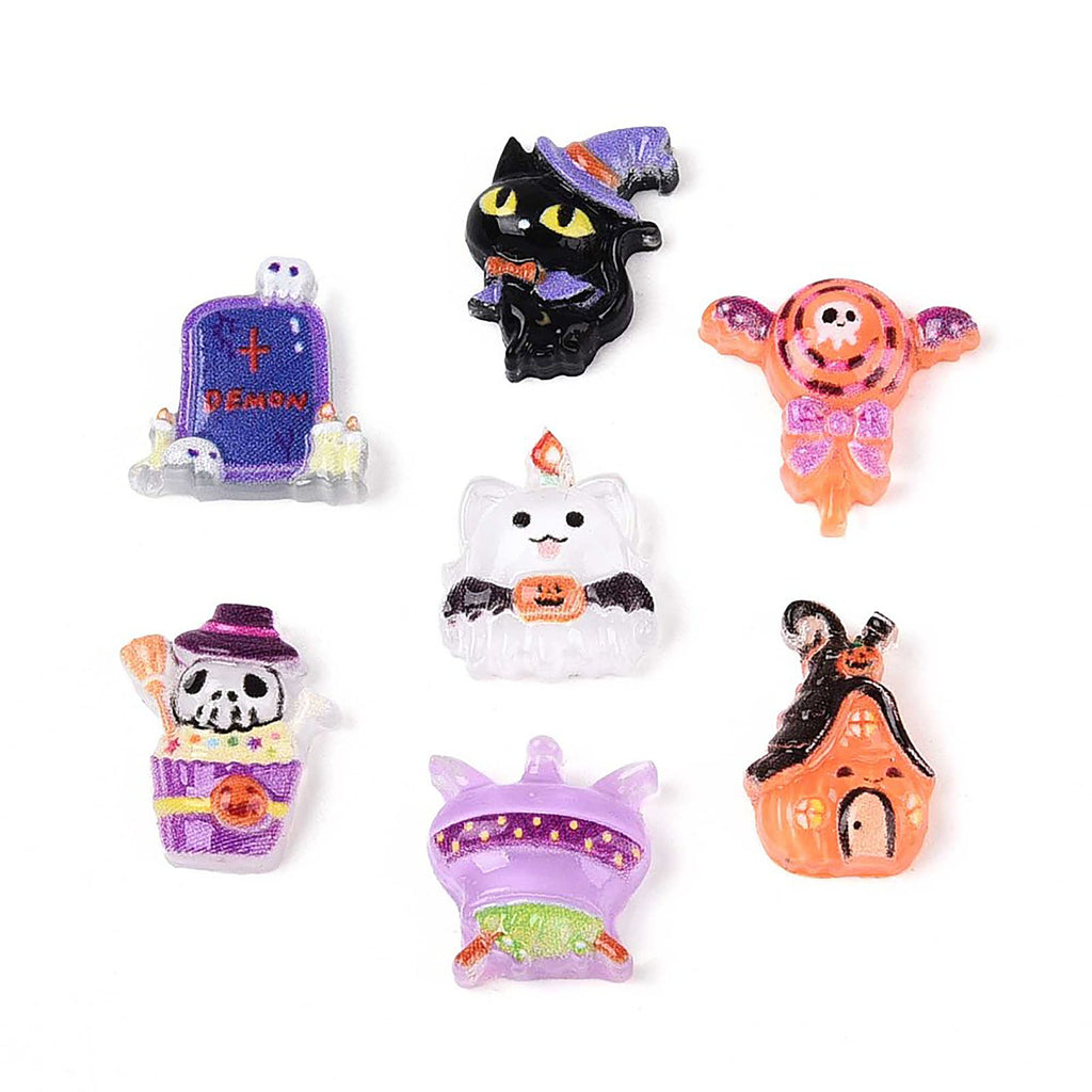 a collection of seven Halloween-themed objects, including a tombstone, a cat, a ghost, a skeleton, a witch's hat, a bat, and a house.