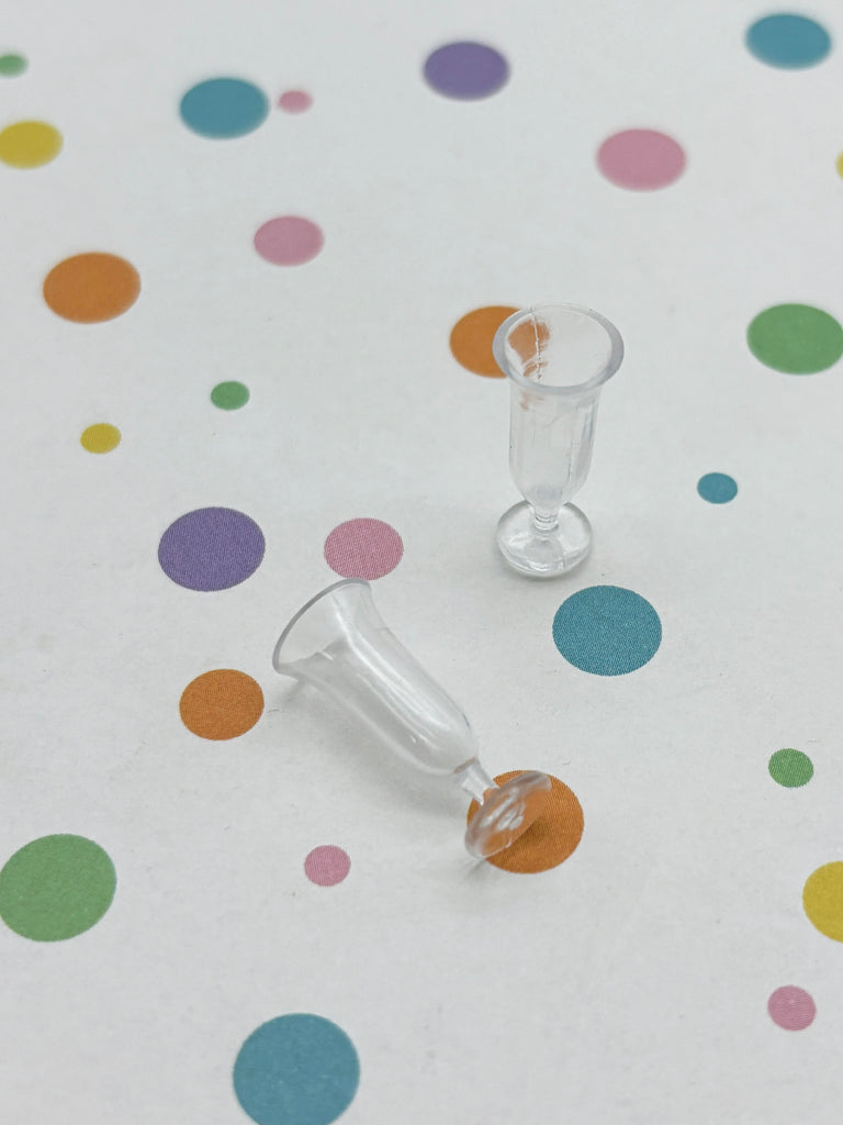 a small glass pipe sitting on top of a table