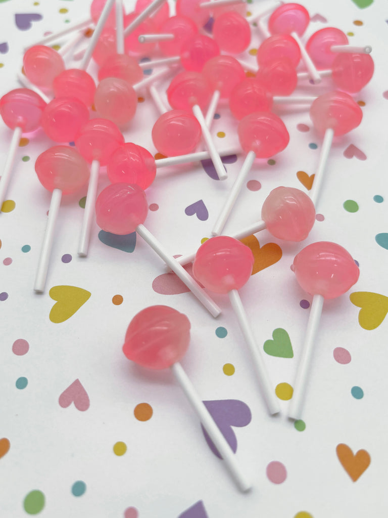 a bunch of lollipops sitting on top of a table