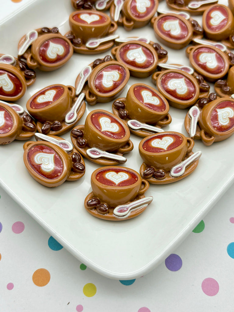 a white plate topped with lots of chocolate covered pretzels