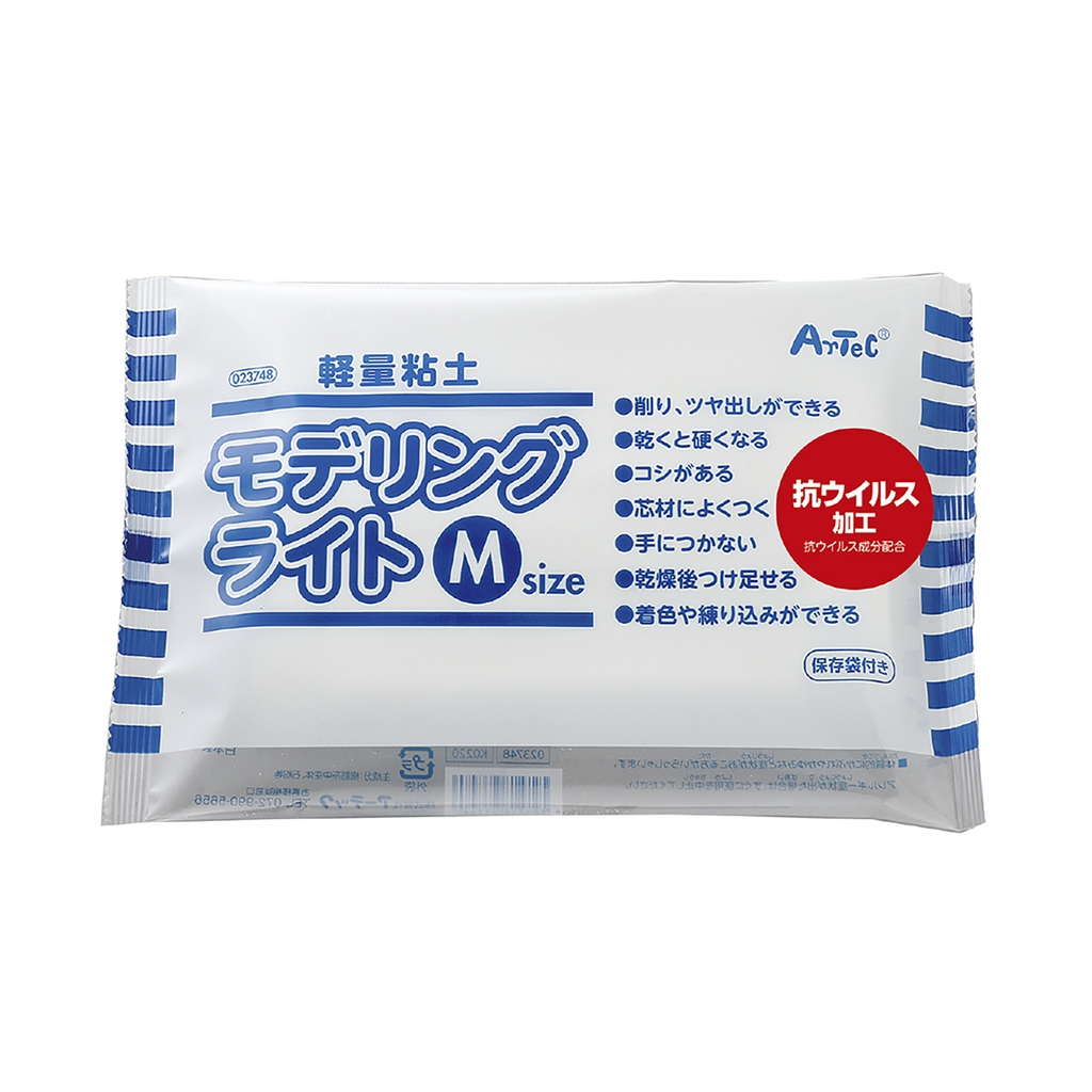 a packet of japanese toothpaste on a white background