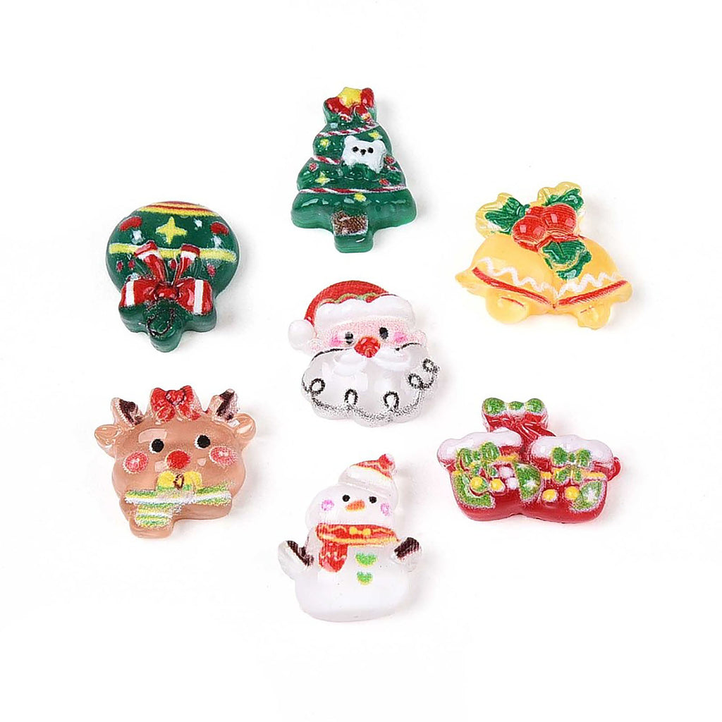 seven colorful Christmas-themed buttons or decorations, including a Christmas tree, a bell, a reindeer, a snowman, a Santa hat, and a bell.