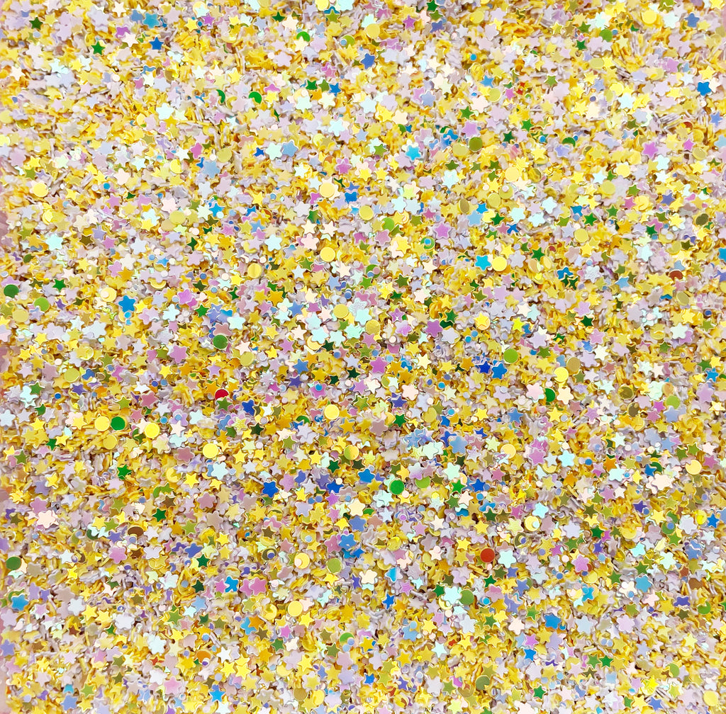 The image is a collage of various colorful glitter pieces, creating a vibrant and festive atmosphere.