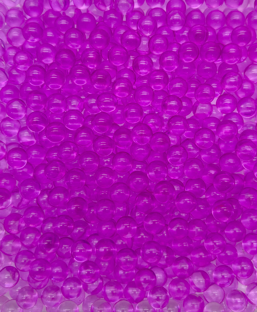 a bunch of bubbles that are purple in color