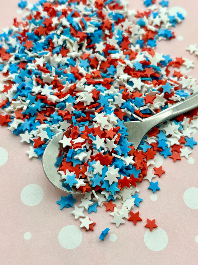 a spoon full of red, white and blue stars