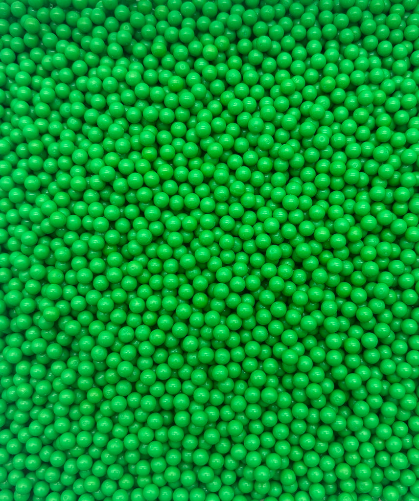 a close up view of green balls