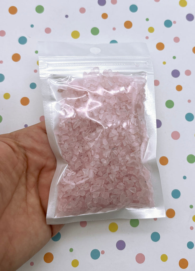 a bag of pink rice sitting on top of a table