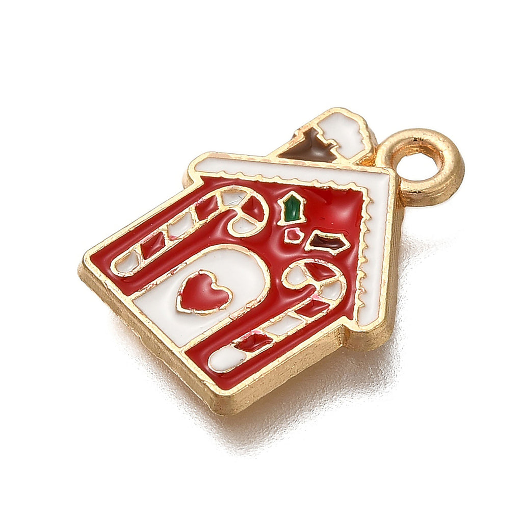 A small, ornate, and colorful pendant or charm in the shape of a house, with red and white colors and decorative elements such as a heart and candy canes.