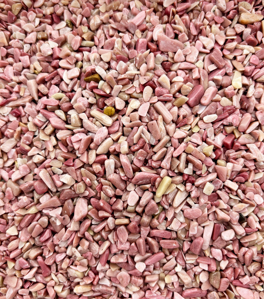 a close up of a pile of pink gravel