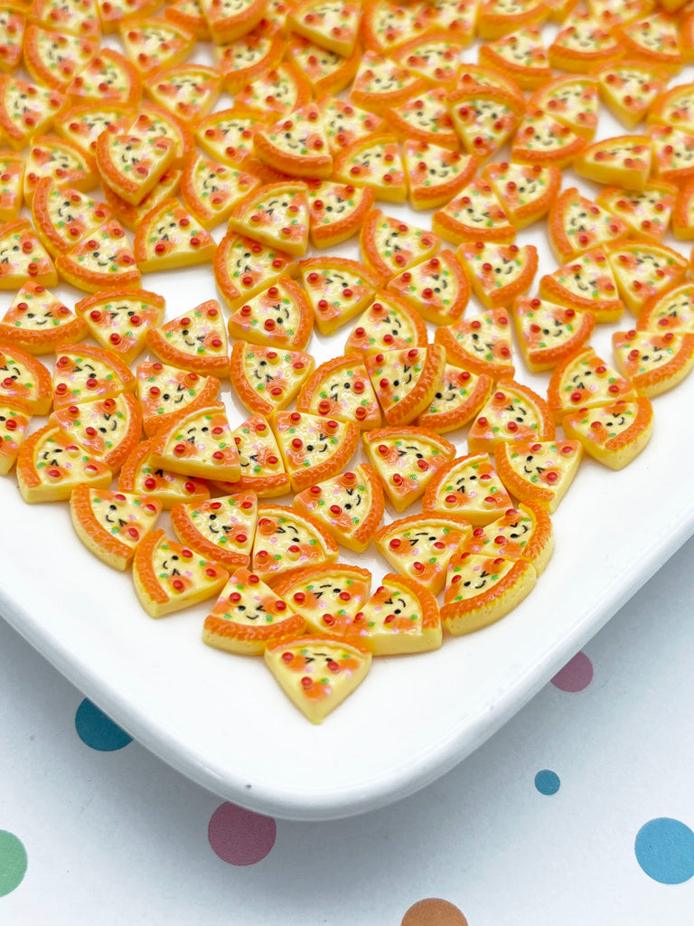 a white plate topped with lots of heart shaped cookies