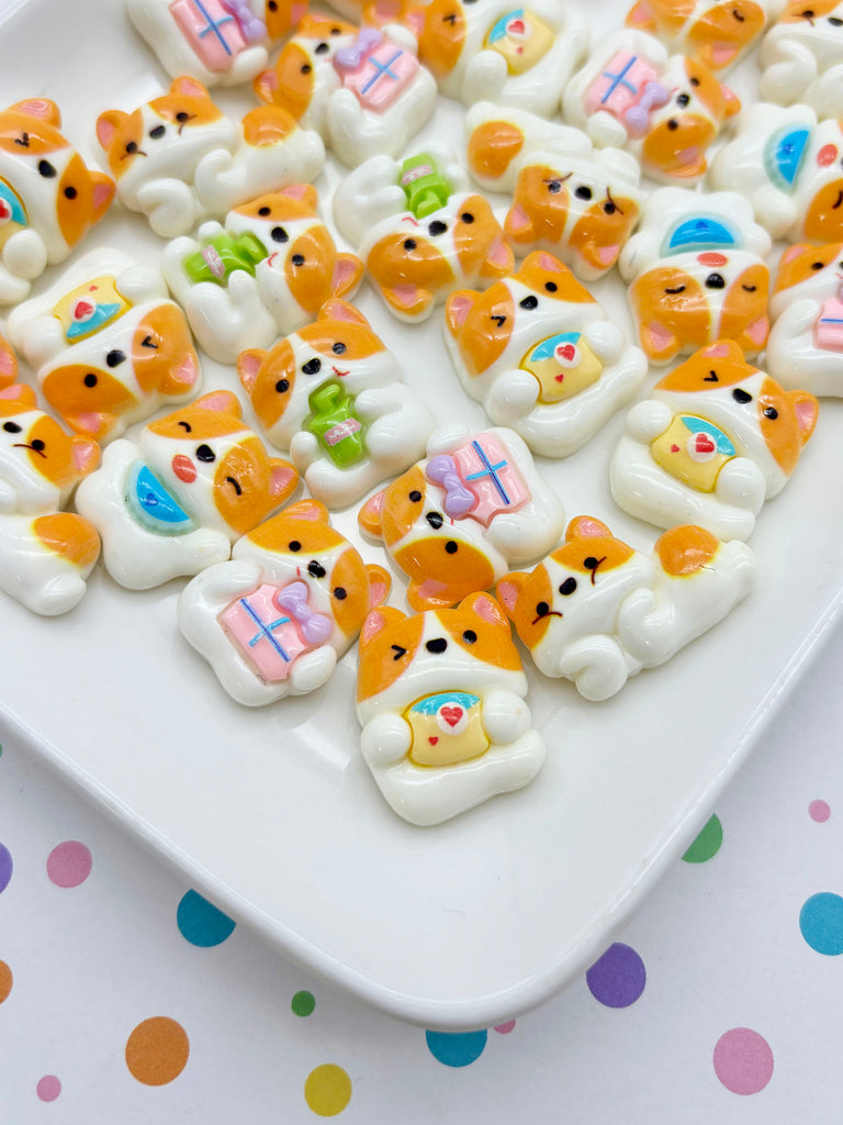 a white plate topped with lots of teddy bears