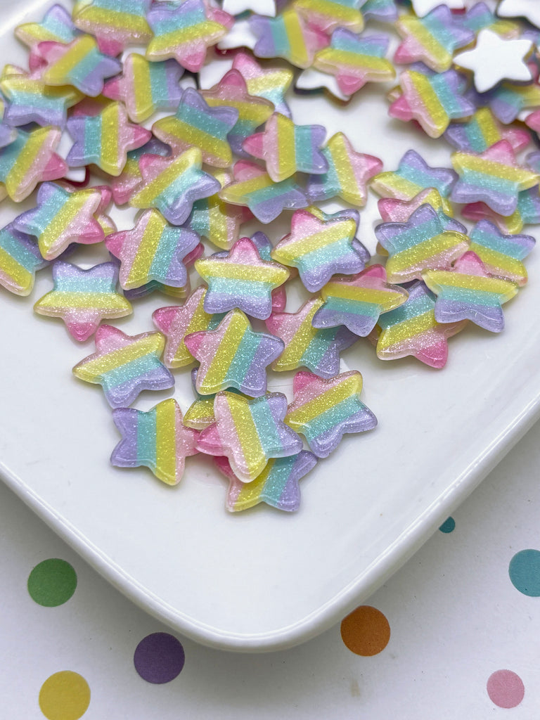 a white plate topped with lots of colorful stars