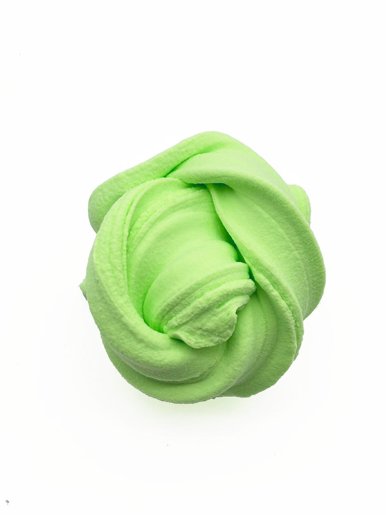 A single, round, green, fluffy substance resembling a cloud or a soft, malleable material.