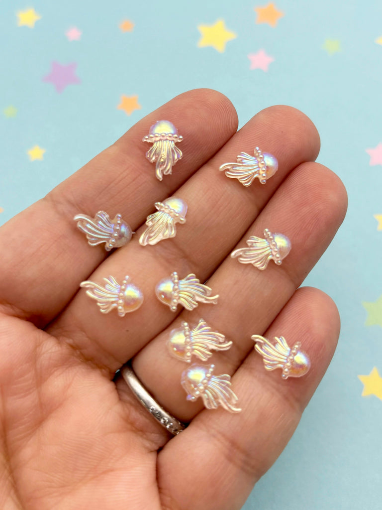 a person is holding a bunch of tiny bees