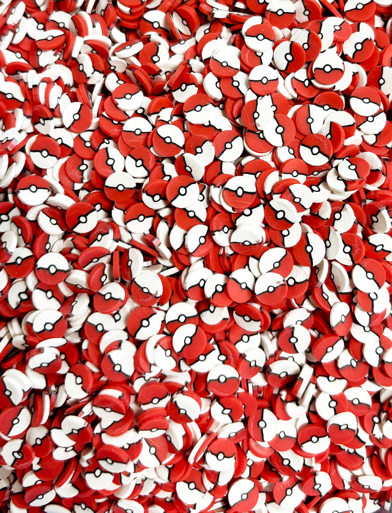 a pile of red and white hearts on a table