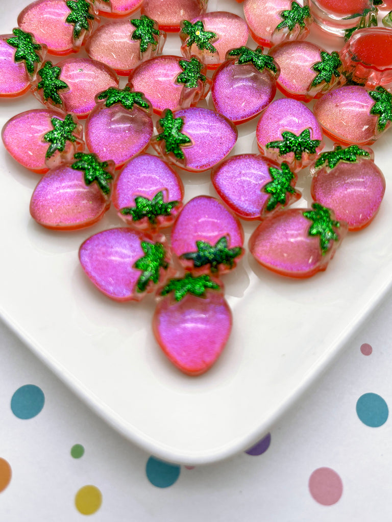 a white plate topped with pink and green fruit