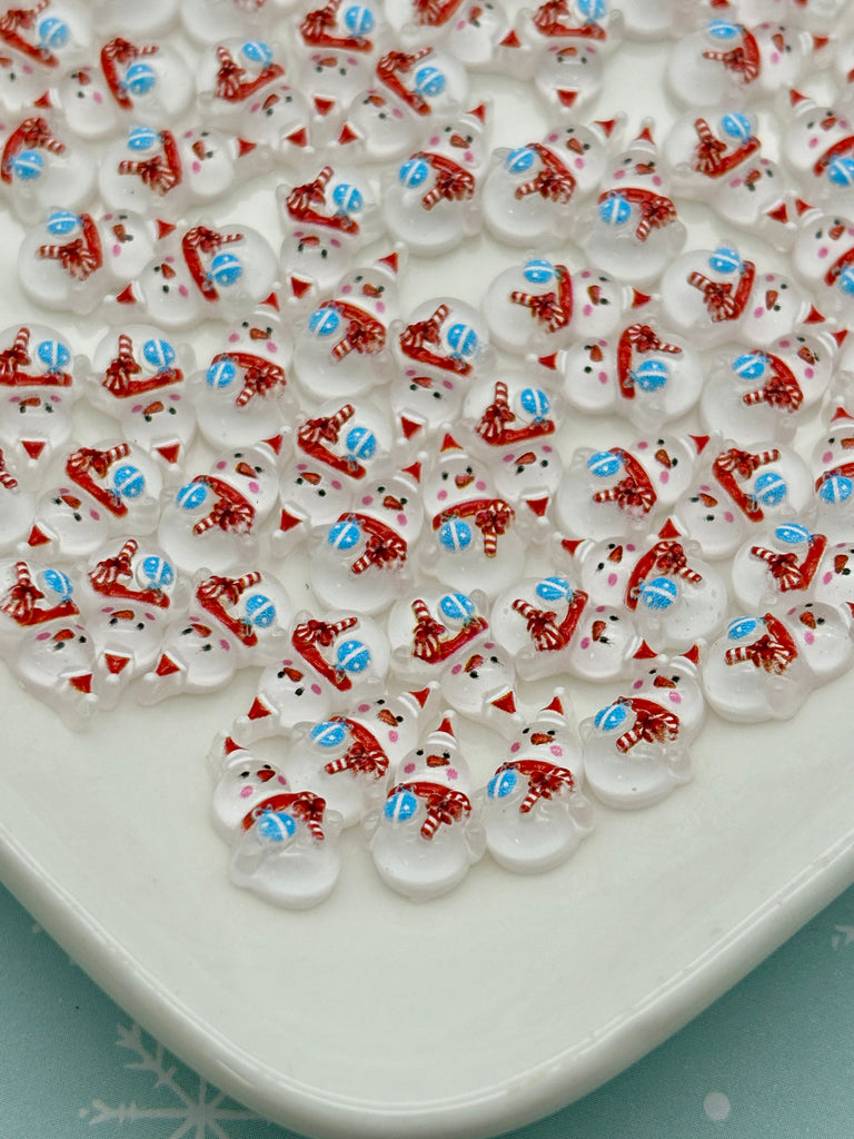 a white plate topped with lots of red white and blue buttons