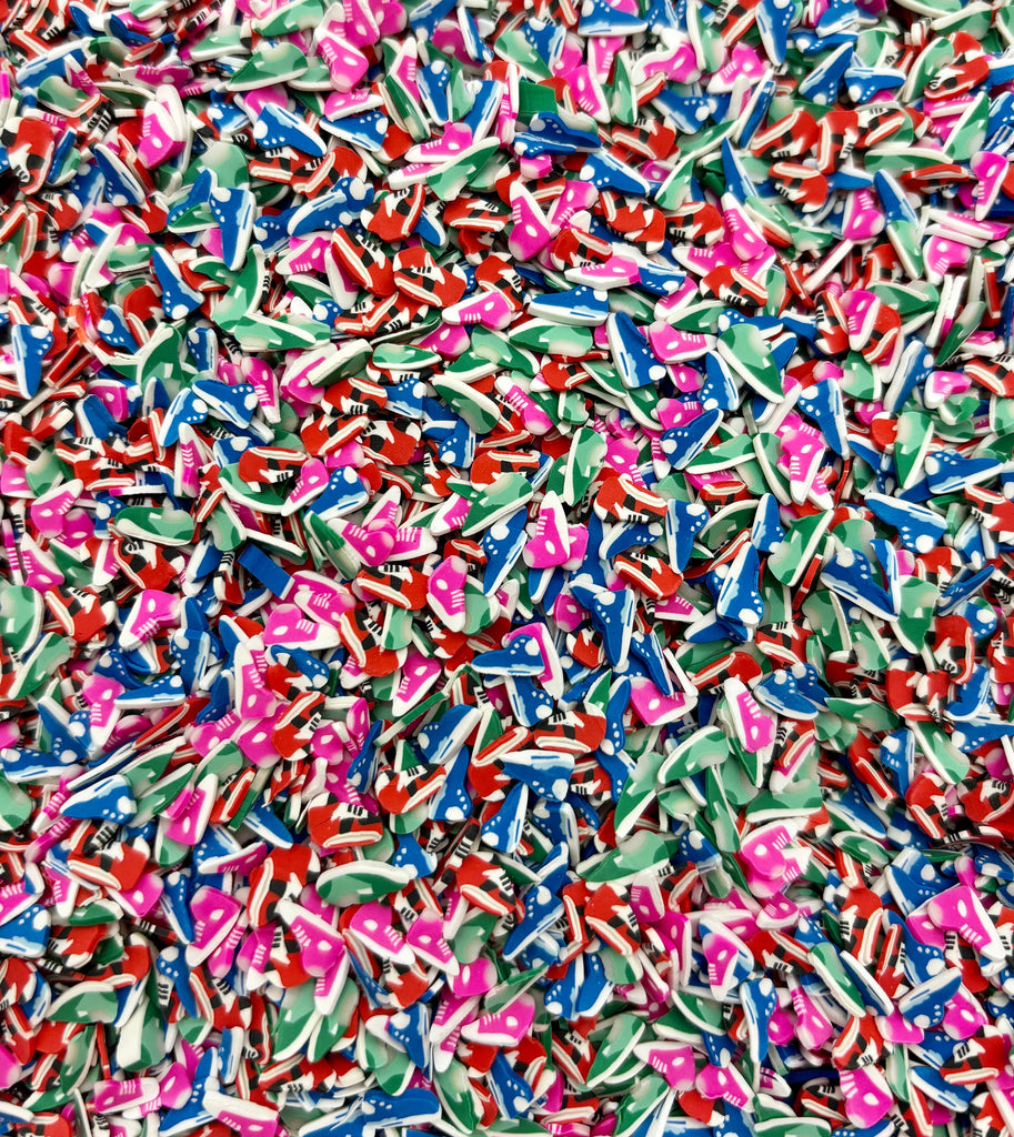 a large pile of colorful sprinkles on a table