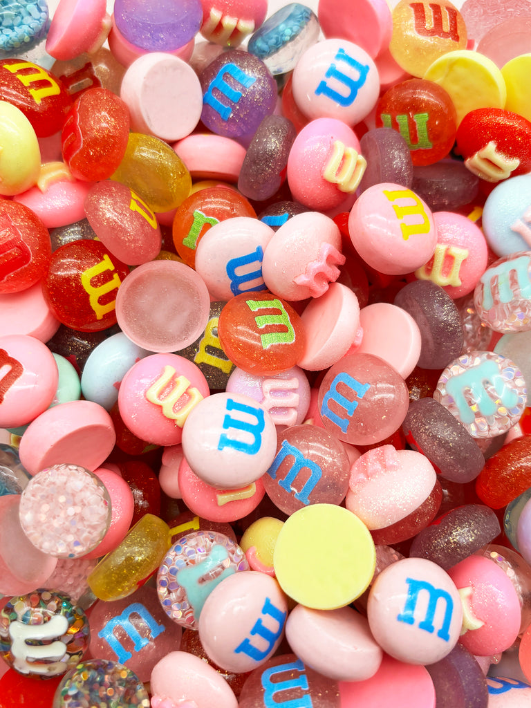 a close up of a pile of candy