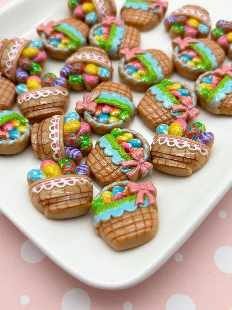 a white plate topped with lots of decorated cookies