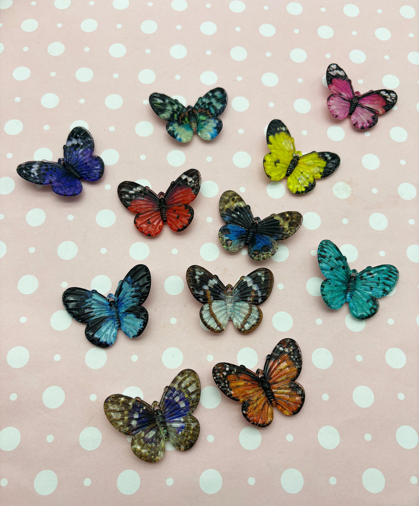 a group of butterflies sitting on top of a table