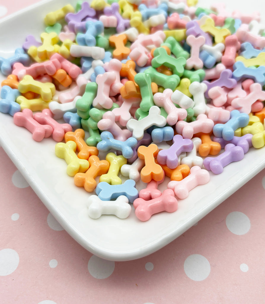 a white plate topped with lots of colorful candies