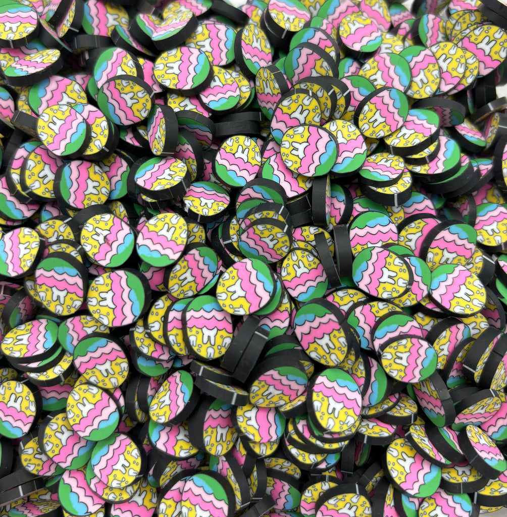 a pile of colorful buttons sitting on top of each other