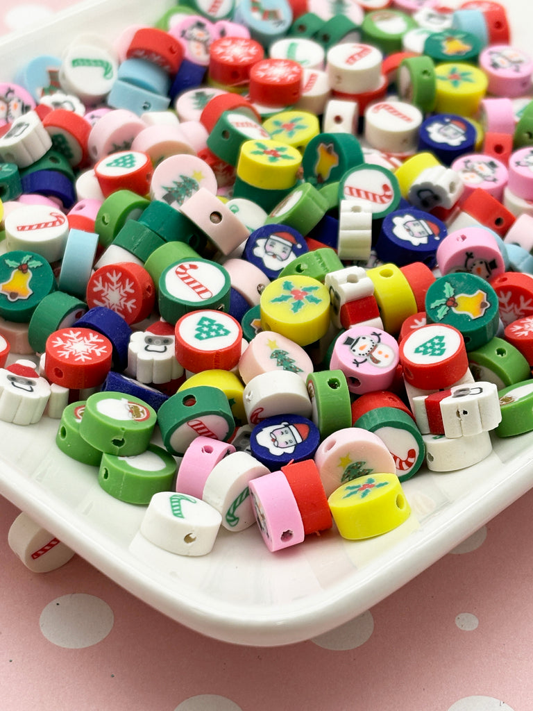 a white plate topped with lots of different colored buttons